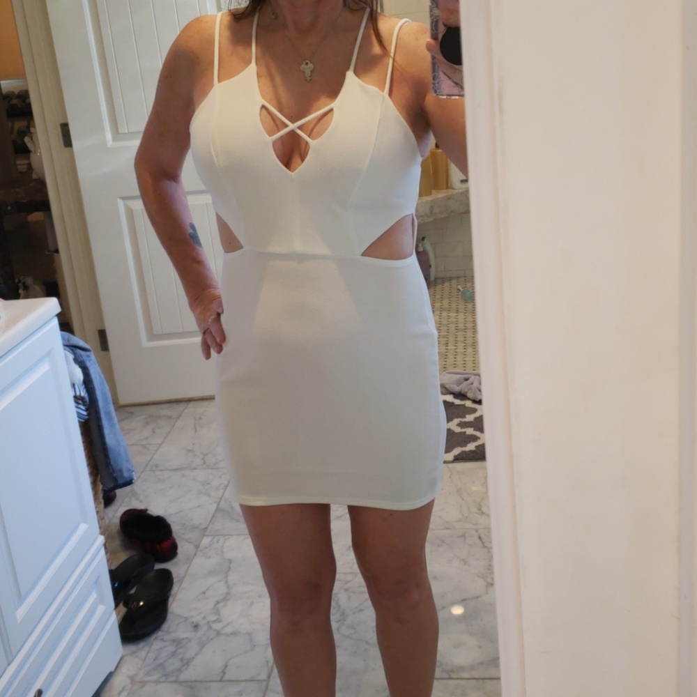 White dress. Top is lined skirt is not.